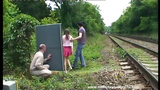 A guy jerks off while watching a couple fucking outdoors