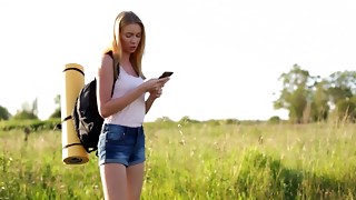 Blonde teen takes cock in pussy while exposed in nature